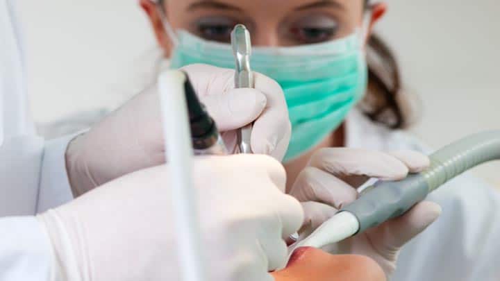 dentist, dental hygienist, drill, mask, gloves, patient